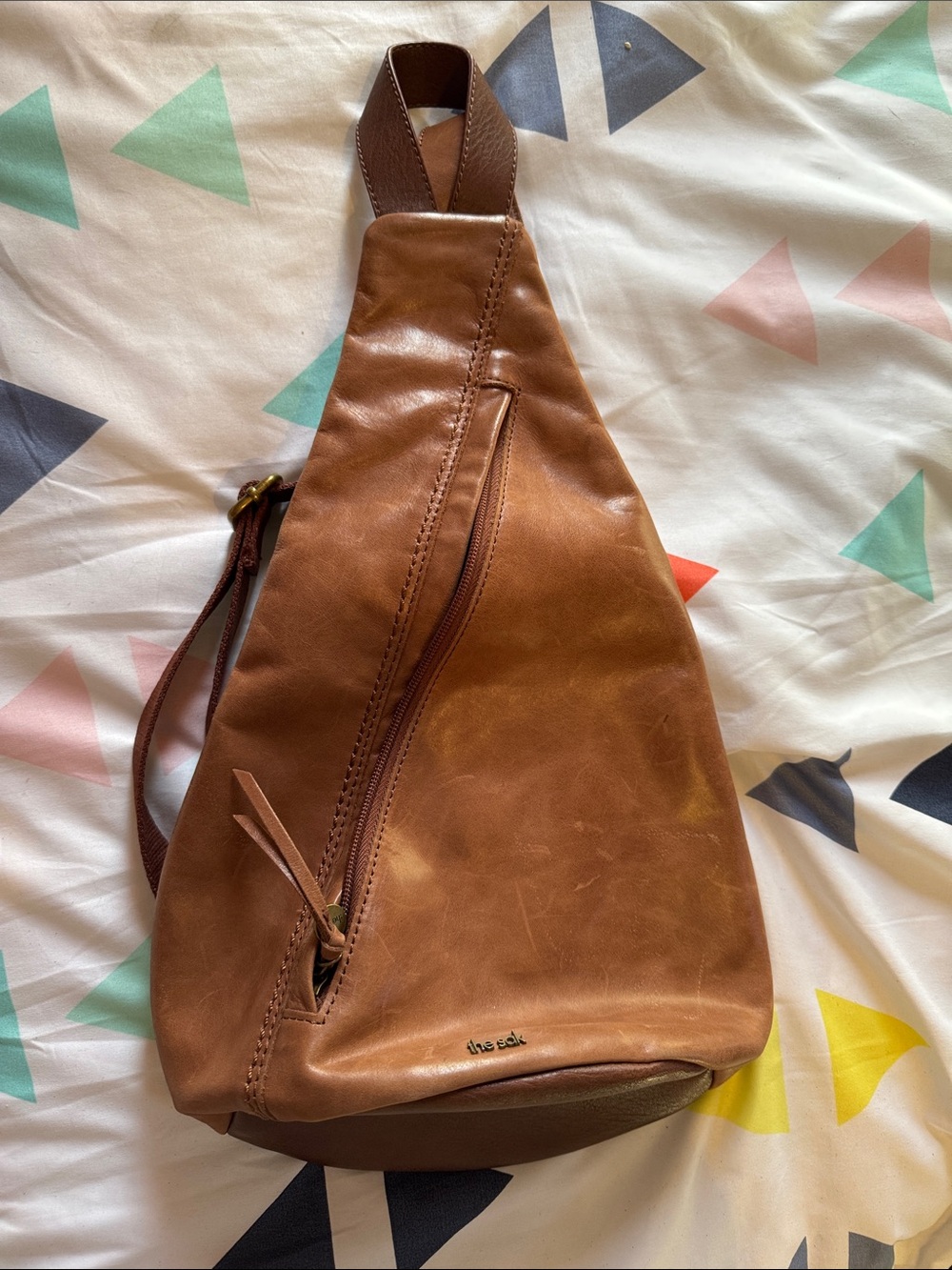 The Sak Tan Brown Leather Sling Backpack